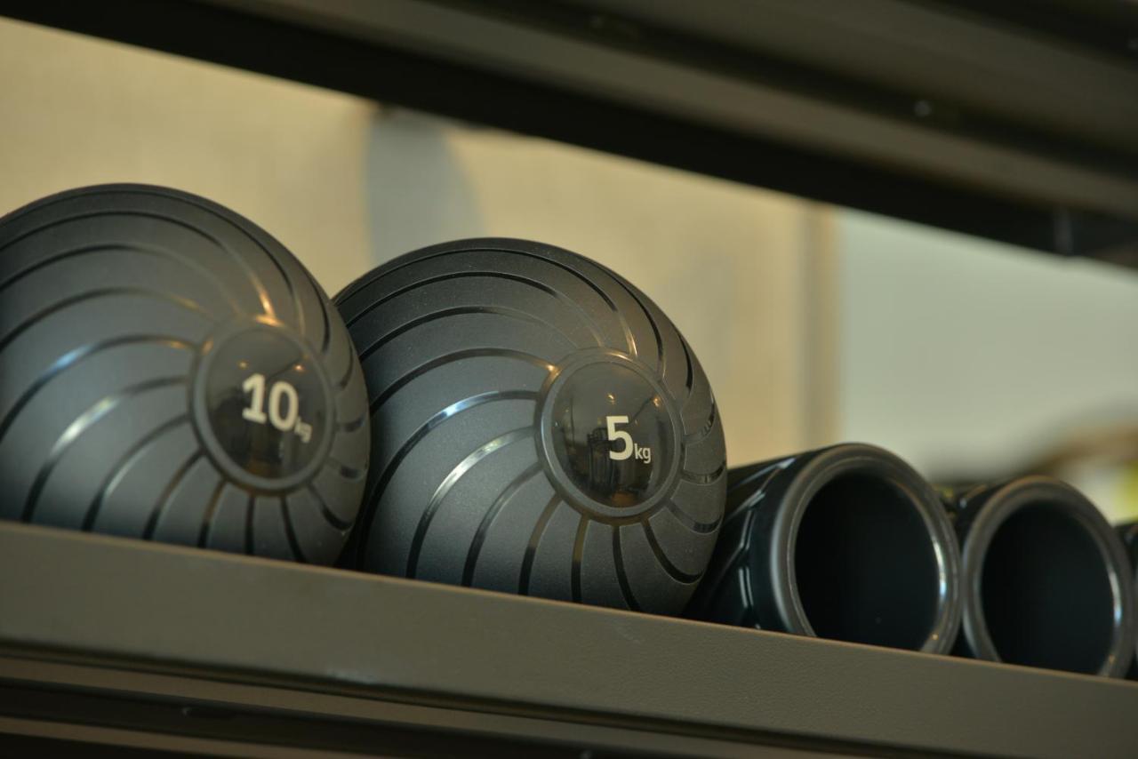 Mk Hotel Tirana Rinas Exterior photo A set of kettlebells