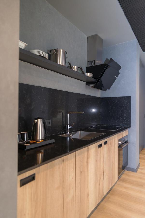 Mk Hotel Tirana Rinas Exterior photo A kitchen in a serviced apartment in Paris